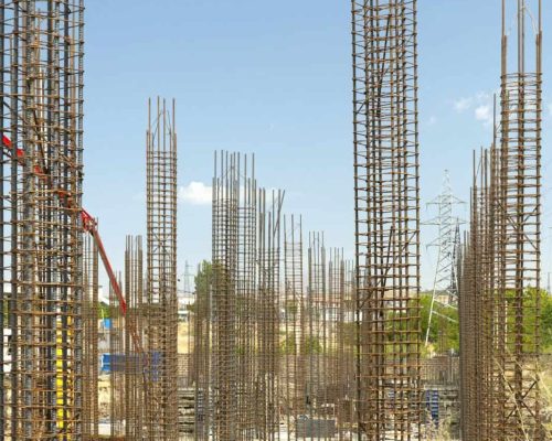 Concrete construction and reinforcement at a construction site