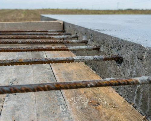 Reinforcing bars sticking out of reinforced concrete slab